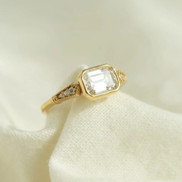 HORIZONTAL EMERALD CUT SOLITAIRE RING - Mim Diamond